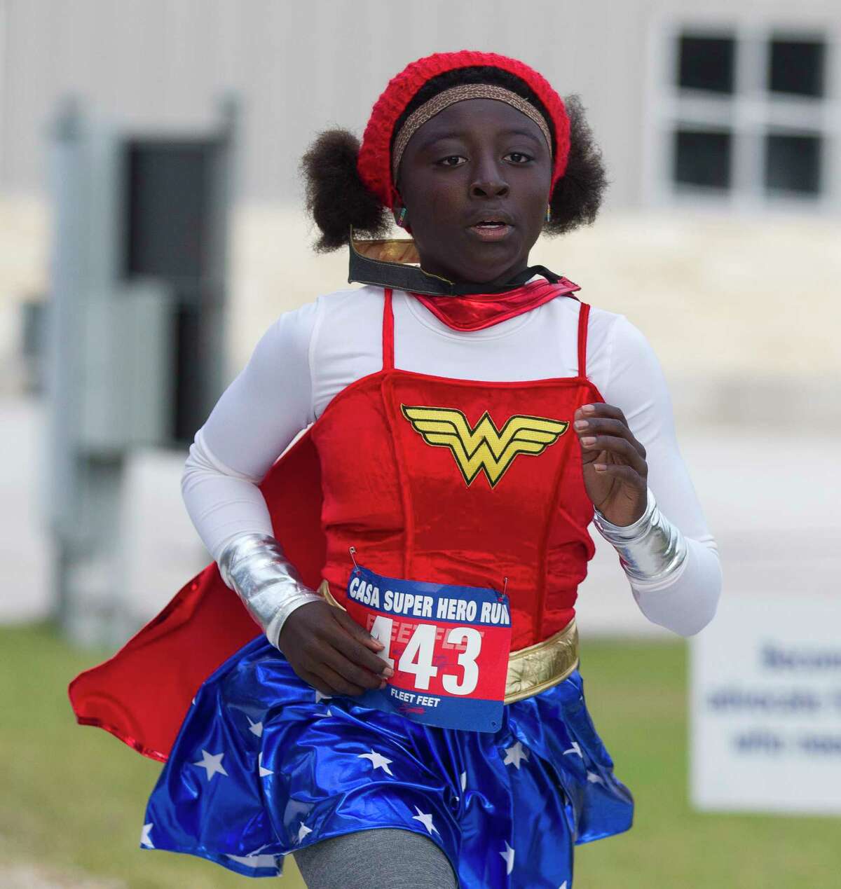 Becca Kelly takes part in the annual CASA Superhero Run at The Woodlands Christian Academy, Saturday, Oct. 28, 2017, in The Woodlands.