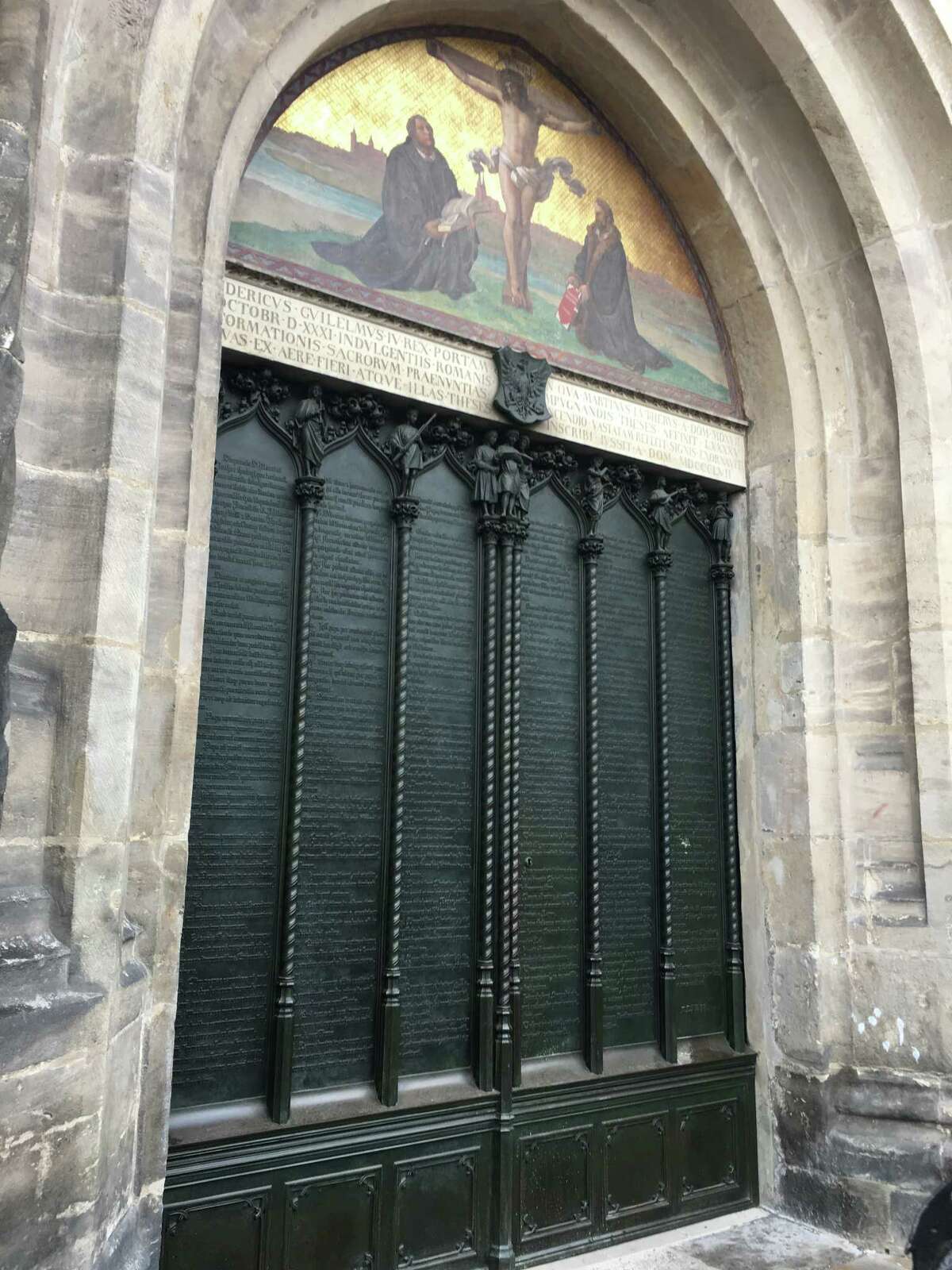 The church doors in Wittenberg, Germany, where Martin Luther nailed his 95 Theses 500 years ago, sparking religious and cultural effects still felt today.