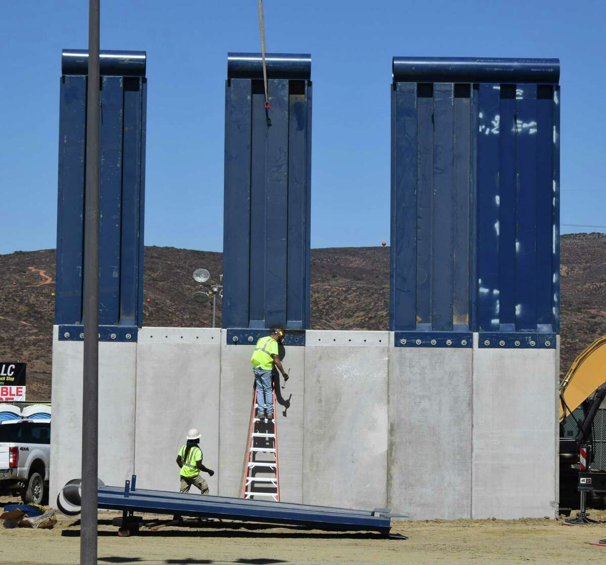 A border wall prototype being constructed near Otay Mesa, California in October which can be seen by crossing into Tijuana, Mexico.