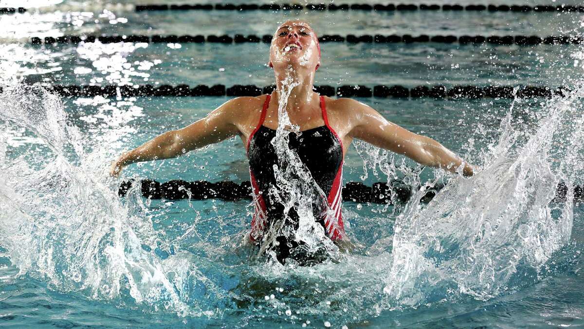 Synchronized swimmer Natalia Vega, a sophomore at University of the Incarnate Word, practices in the college pool.