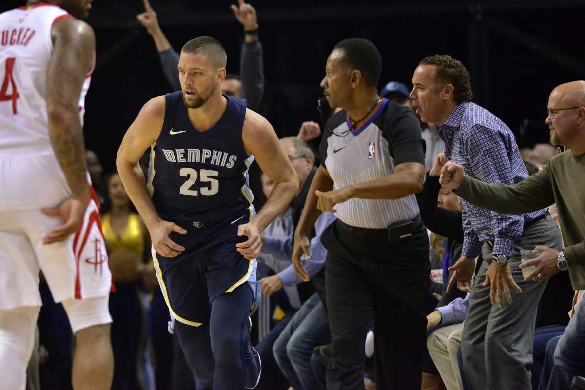 Memphis Grizzlies forward Chandler Parsons (25) runs up the court after scoring a three-point shot in the first half of an NBA basketball game against the Houston Rockets Saturday, Oct. 28, 2017, in Memphis, Tenn. (AP Photo/Brandon Dill)