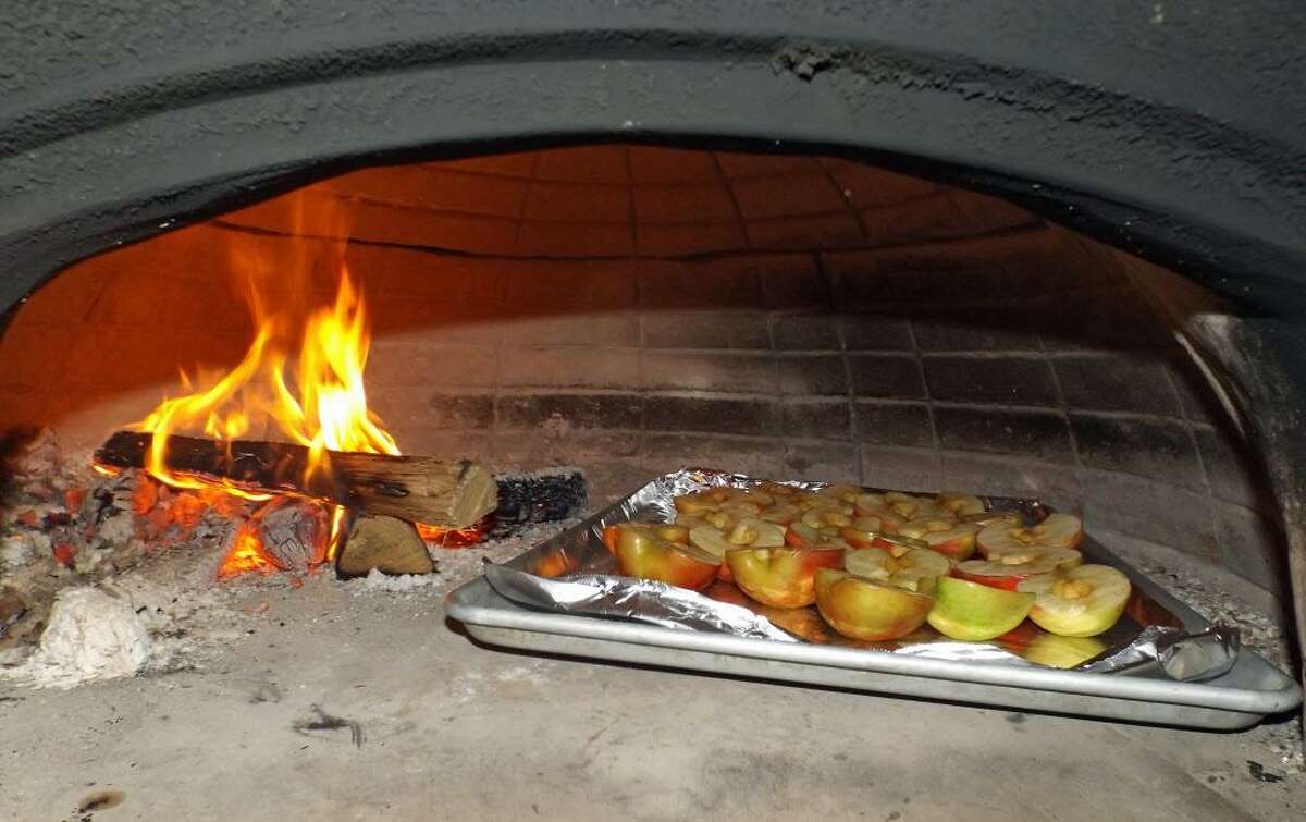 Roasted apples hit the oven.