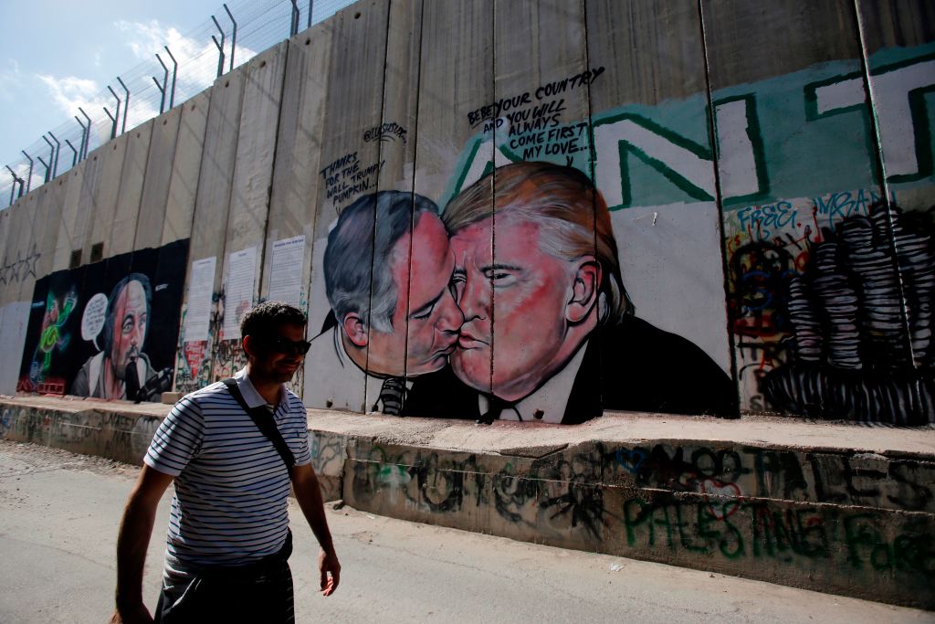 Mural Of Trump Kissing Netanyahu Pops Up On West Bank Wall - Houston ...