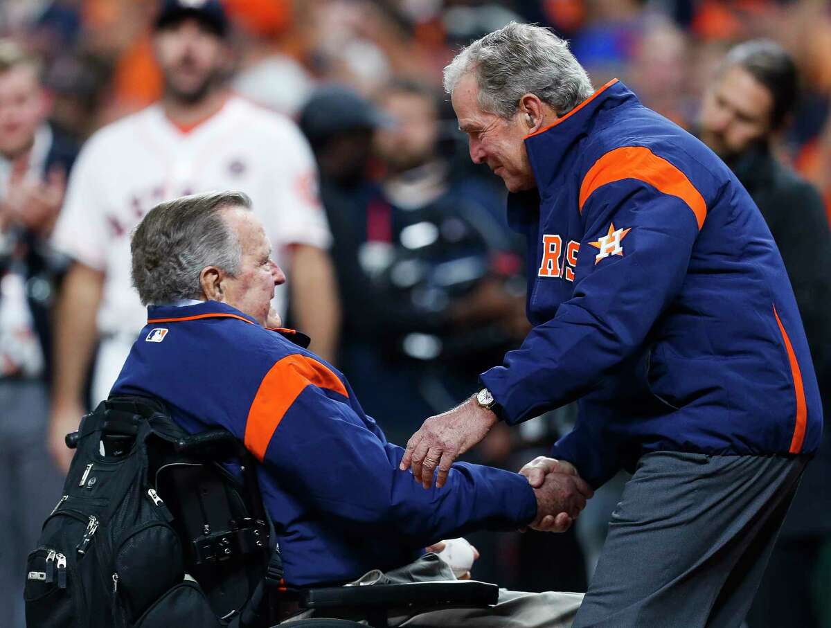 PHOTOS: George H.W. Bush's best motivational quotes  Former President George H.W. Bush and his son, former President George W. Bush, throw out the first pitch of Game 5 of the World Series to at Minute Maid Park on Sunday, Oct. 29, 2017, in Houston.  >>>Browse through the gallery for a look at the former President's motivational quotes ... 