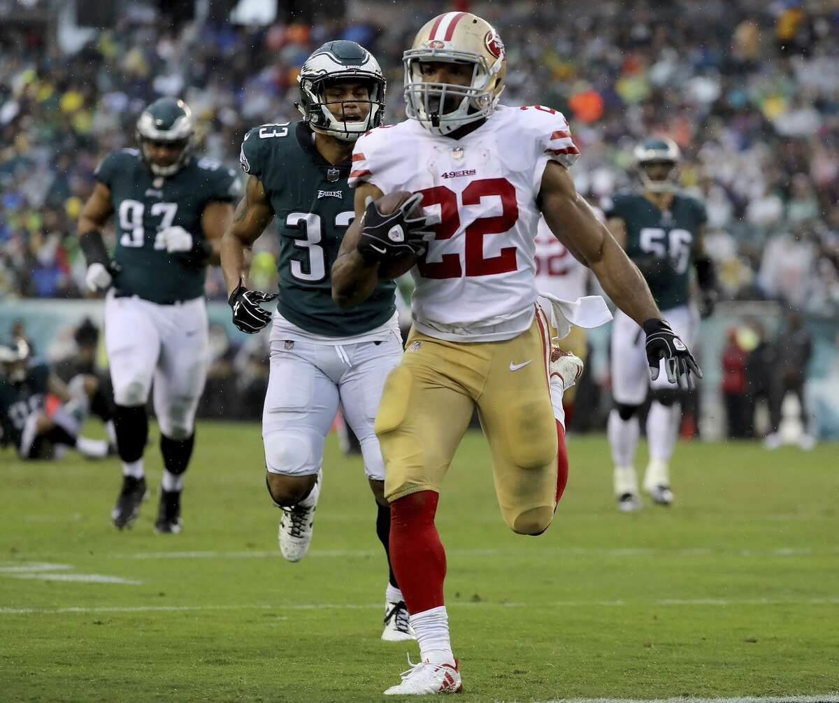 Matt Breida speeds toward the end zone after catching a shovel pass. His 21-yard reception resulted in his first NFL touchdown.