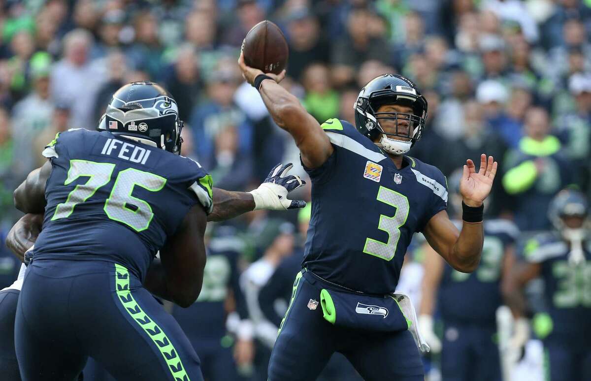 Seattle Seahawks quarterback Russell Wilson (3) throws the ball against the Houston Texans during the second half of the game at CenturyLink Field Sunday, Oct. 29, 2017, in Seattle. The Seahawks won 41-38.