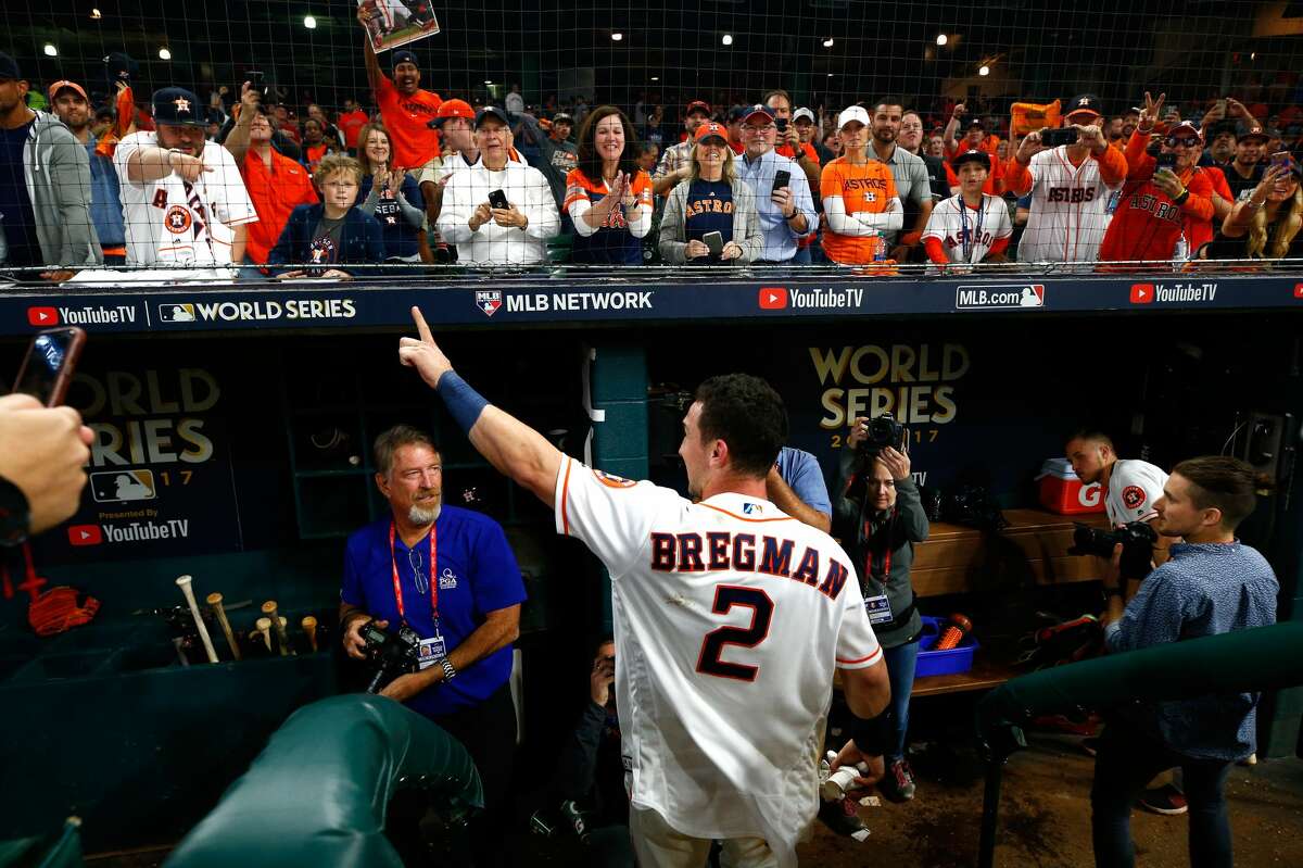 Alex Bregman #2 of the Houston Astros celebrates after hitting the game-winning single during the tenth inning to defeat the Los Angeles Dodgers in game five of the 2017 World Series at Minute Maid Park on October 30, 2017 in Houston, Texas. The Astros defeated the Dodgers 13-12.