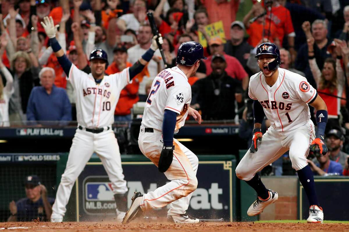 Alex Bregman #2 of the Houston Astros celebrates after scoring on a double by Jose Altuve #27 (not pictured) during the seventh inning against the Los Angeles Dodgers in game five of the 2017 World Series at Minute Maid Park on October 29, 2017 in Houston, Texas.