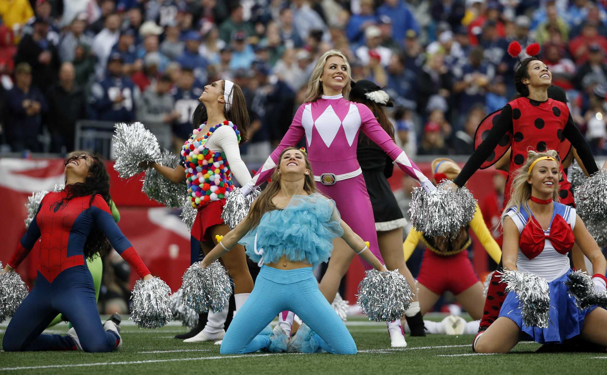 New England Patriots cheerleaders perform in Halloween costumes in the  first half of a…