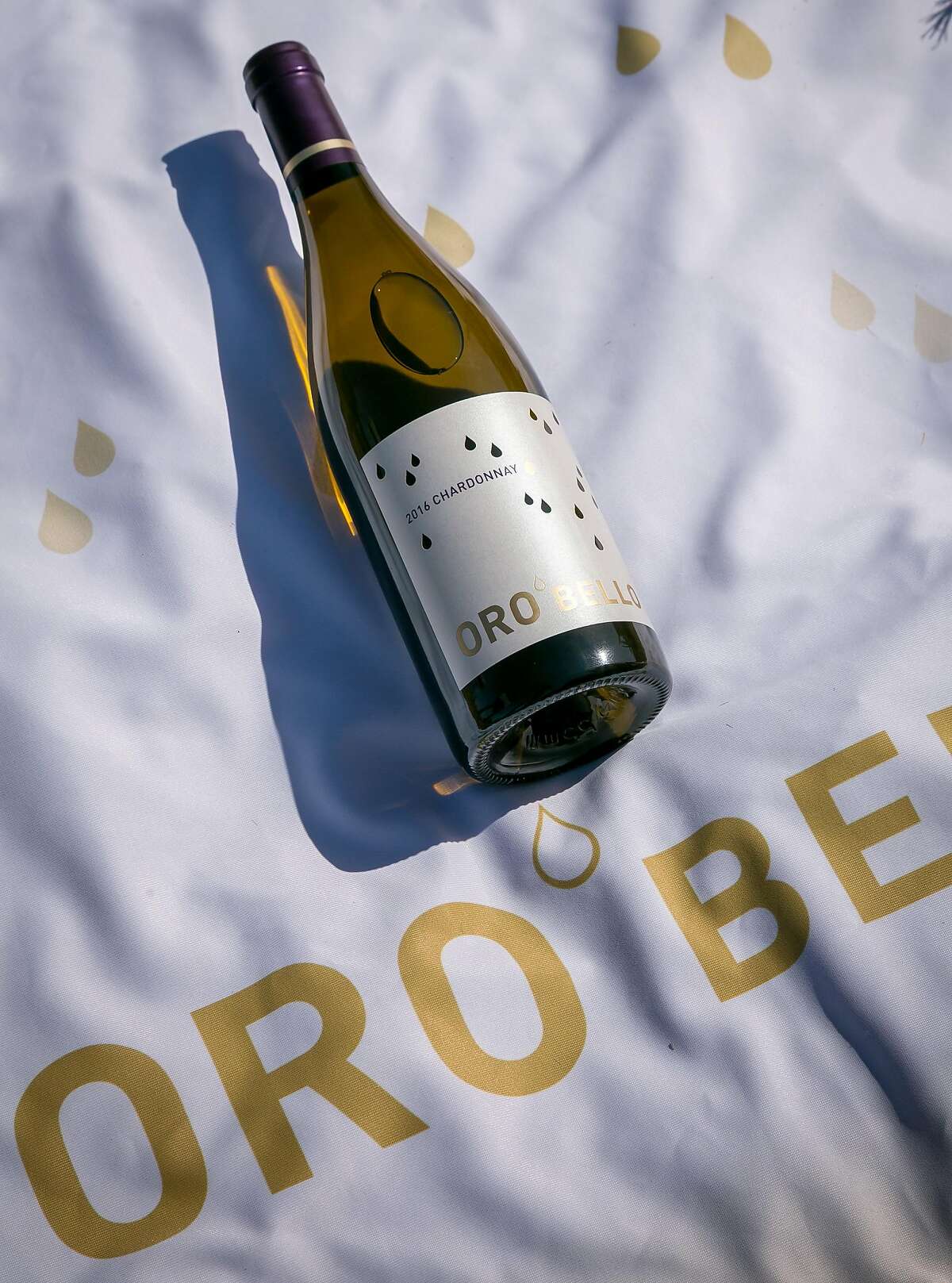 Marketing materials for Atlas Wine Co., whose lineup includes the $17.99 Oro Bello Chardonnay.