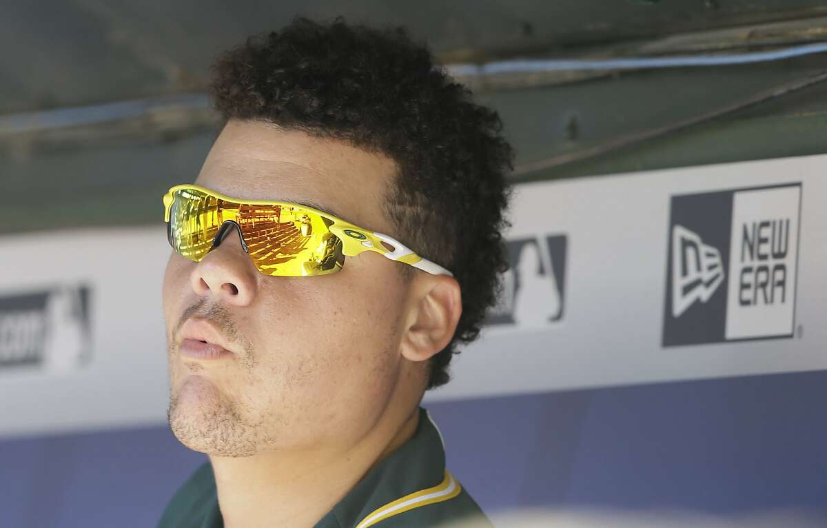 Oakland Athletics catcher Bruce Maxwell sits int he dugout during a baseball game against the Texas Rangers in Arlington,Texas, Sunday, Oct. 1, 2017. (AP Photo/LM Otero)