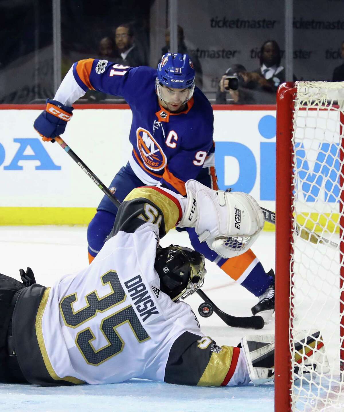 NEW YORK, NY - OCTOBER 30: Oscar Dansk #35 of the Vegas Golden Knights blocks the net against John Tavares #91 of the New York Islanders during the second period at the Barclays Center on October 30, 2017 in the Brooklyn borough of New York City. (Photo by Bruce Bennett/Getty Images) ORG XMIT: 775040725