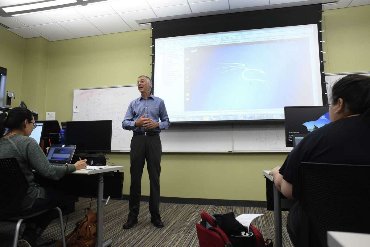 Dr. Kevin Barton teaches a cyber security class at Texas A&M University - San Antonio on Thursday, Oct. 26, 2017. The university has been redesignated by the National Security Agency as a National Center for Academic Excellence in Cyber Defense Education (CAE-CDE) through the year 2022.
