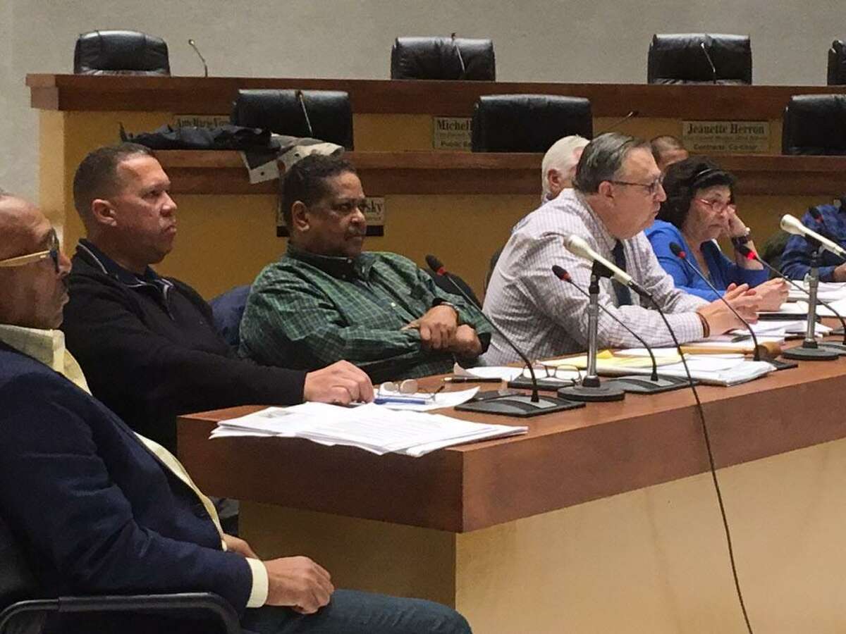 Bridgeport Planning and Zoning members listen to speakers opposed to shrinking the distance between liquor stores and schools. October 30, 2017
