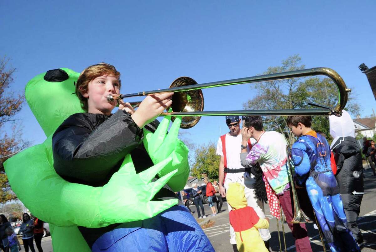 Old Greenwich School Halloween band member and fifth grader James Markline, 10, played the trombone during the annual Halloween parade at the school and down Sound Beach Avenue in Old Greenwich, Conn., Tuesday, Oct. 31, 2017.