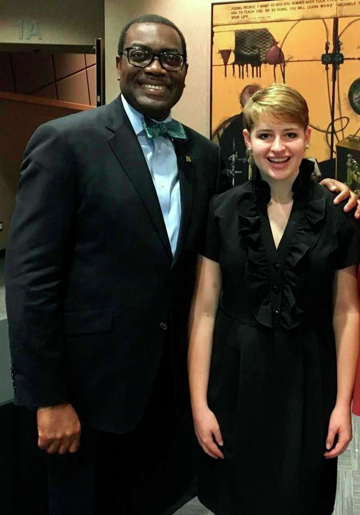 Dr. Akin Adesina, 2017 World Food Prize laureate, greets Cass City teen Addy Battel at the World Food Prize Global Youth Institute. Adesina is credited with transforming agriculture in Africa. He inspired youth with stories of growing up on a small farm in Nigeria. (Submitted Photo)