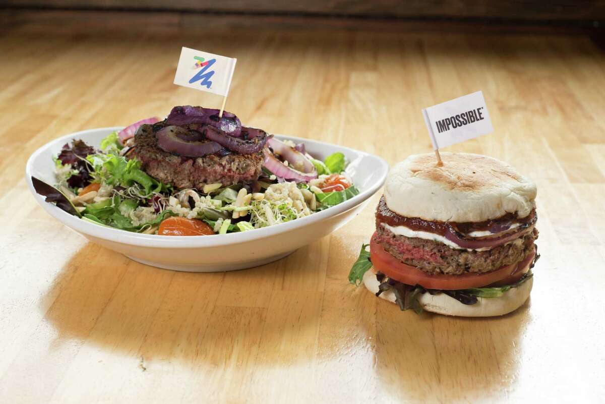 The Counter burger restaurants has added the Impossible Burger to its menu offerings. The Impossible Burger is a plant-based meatless burger that cooks and tastes like ground beef. Shown: the Impossible Salad, and the Counter's signature Impossible burger.