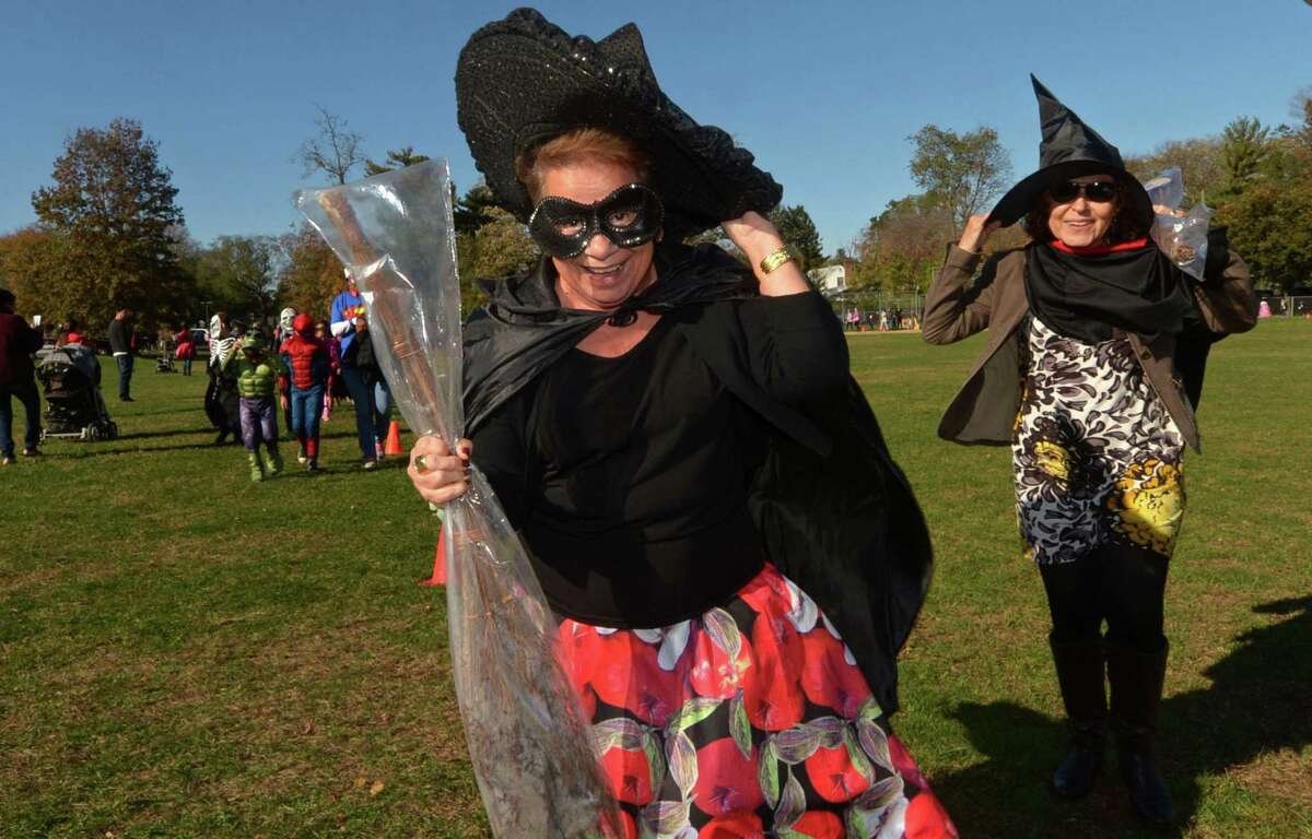 School Secretary Margie Faugno and Assistant Secretary Irma Luppino march along as Brookside Elementary School holds their annual Halloween Parade Tuesday, October 31, 2017, outside the school in Norwallk, Conn.
