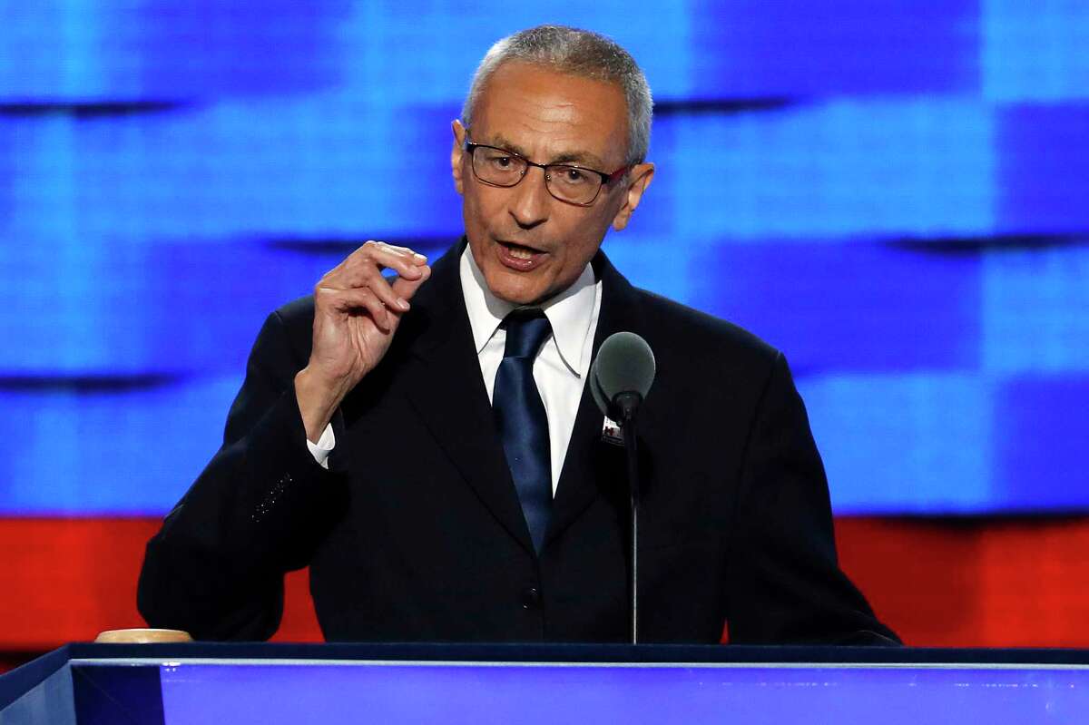 FILE - In this July 25, 2016, file photo, John Podesta, Clinton campaign chairman, speaks during the first day of the Democratic National Convention in Philadelphia. The indictment that alleges covert foreign lobbying by two former Trump campaign officials is casting shadows on three powerful Washington lobbying and legal firms, with Democratic as well as Republican ties, broadening the stakes of the Russia investigation to both parties and drawing in Tony Podesta, the brother of Hillary ClintonÂ?’s campaign chairman. (AP Photo/J. Scott Applewhite, File)