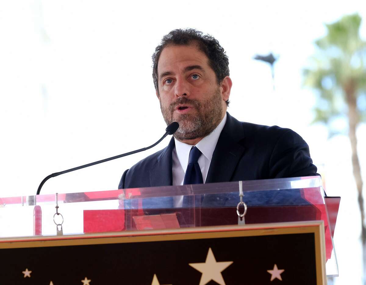 FILE --  This file photo taken on January 19, 2017 shows Brett Ratner attending his star on the Walk of Fame ceremony in Hollywood. Actresses Natasha Henstridge and Olivia Munn and four other women have accused Hollywood director Brett Ratner of sexual misconduct or harassment, the Los Angeles Times reported November 1, 2017. Ratner, 48, director of "Rush Hour" and "X-Men: The Last Stand" among other films, strongly rejected the allegations in a statement to the newspaper from his attorney.