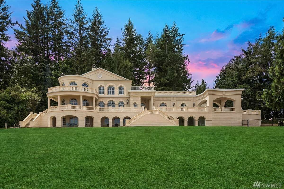 The Johnson Point Beach House in Olympia spans more than 13,000 square feet.  The home has four bedrooms and 5¾ bathrooms, as well as 500 feet of beachfront. It also has a Venetian ballroom, crystal chandeliers, a movie theater and views of the Olympics and Mount Rainier.