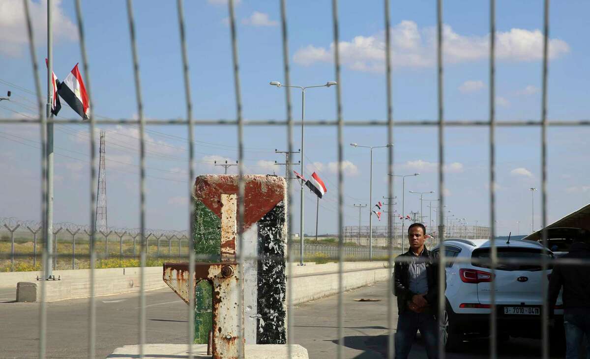 An employee of the Palestinian Authority stands guard on the Palestinian side of the Erez checkpoint between Israel and Gaza, at Beit Hanoun, Gaza Strip, Wednesday, Nov. 1, 2017. The Islamic militant Hamas group has handed over control of GazaÂ?’s border crossings with Israel and Egypt to the internationally recognized Palestinian Authority. WednesdayÂ?’s handover was the first tangible step in implementing a reconciliation deal between and the rival Fatah party, which controls the Palestinian Authority.(AP Photo/Adel Hana)