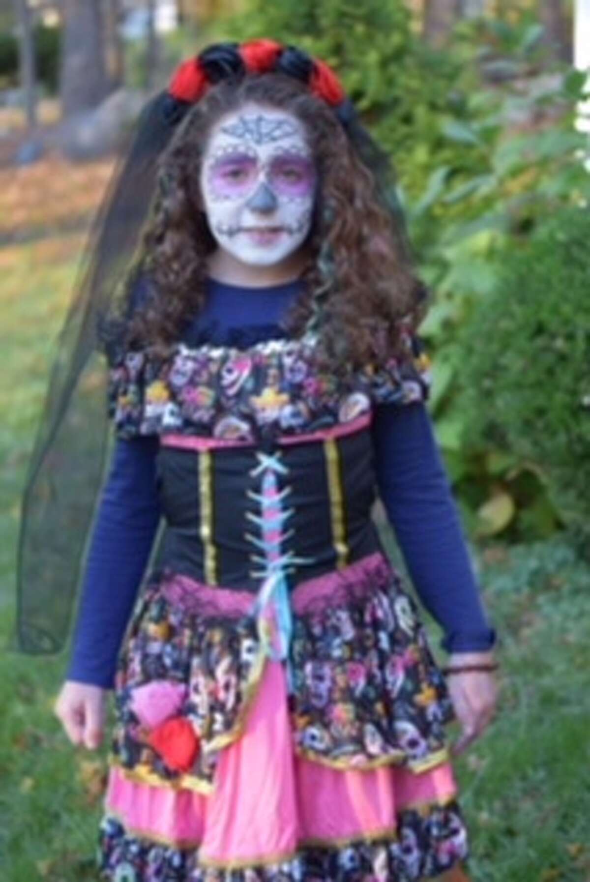 Sylvia Pinheiro, 11, of Brookfield dresses up for Halloween. She even did the makeup herself!