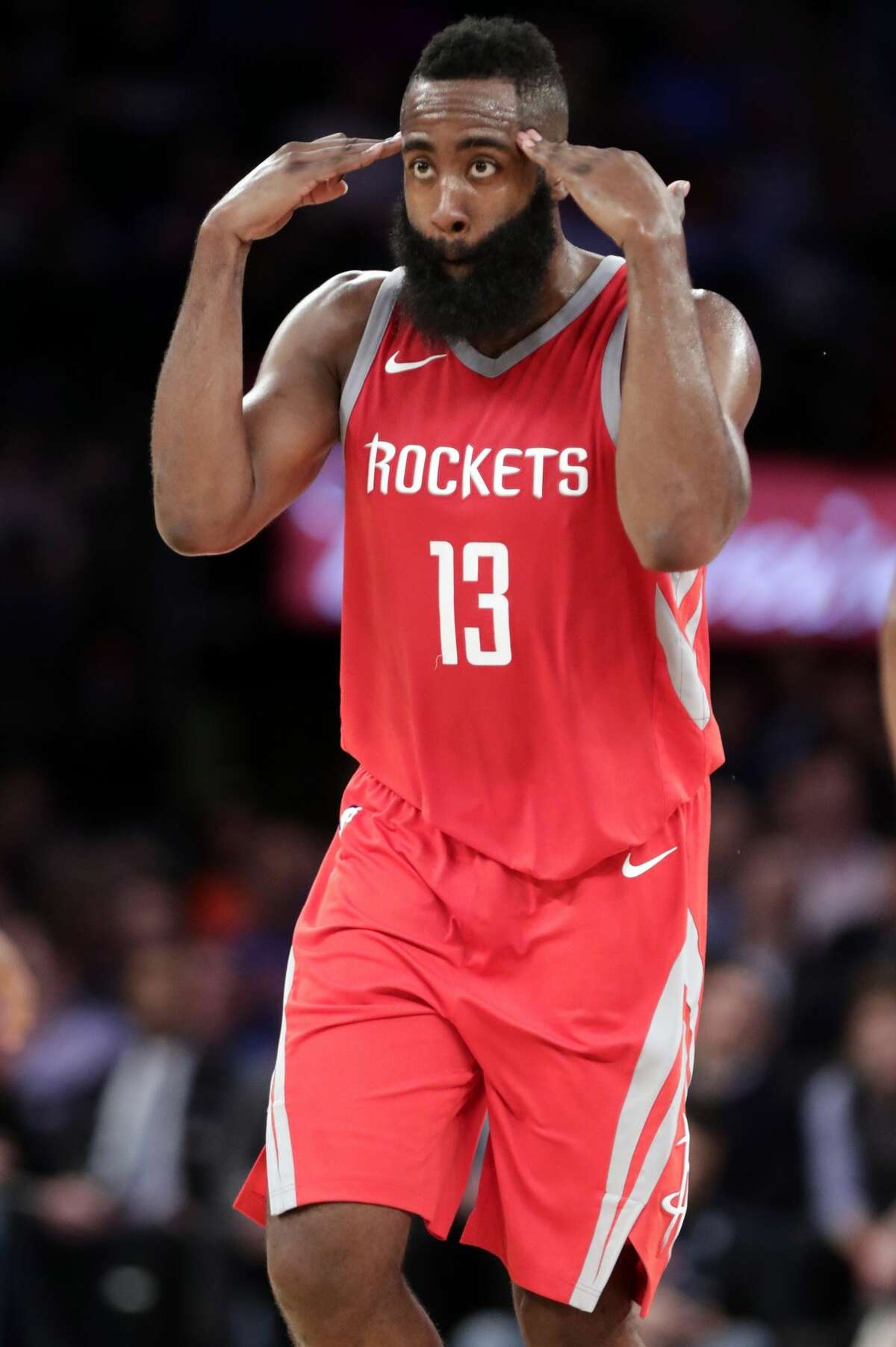 Houston Rockets' James Harden (13) celebrates after making a three point basket during the second half of an NBA basketball game against the New York Knicks Wednesday, Nov. 1, 2017, in New York. The Rockets won 119-97. (AP Photo/Frank Franklin II)