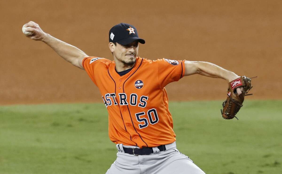 Houston Astros starting pitcher Charlie Morton pitches against the Los Angeles Dodgers during the sixth inning of Game 7 of the World Series at Dodger Stadium on Wednesday, Nov. 1, 2017, in Los Angeles.
