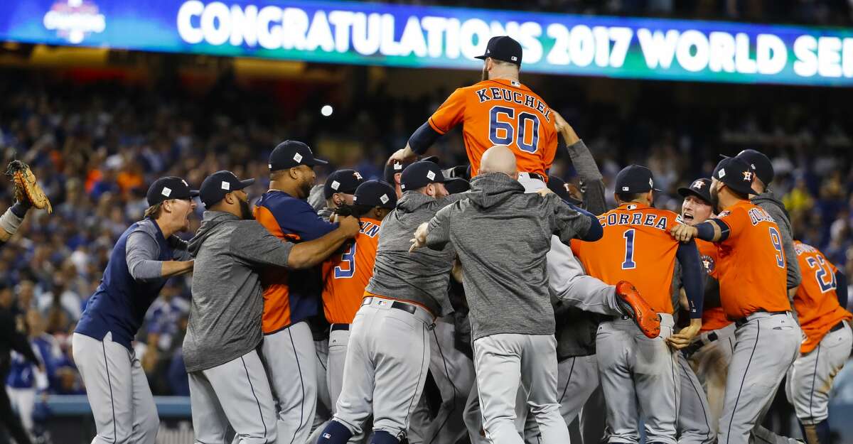 The Astros celebrate their 5-1 win over the Dodgers in Game 7 of the World Series at Dodger Stadium on Wednesday, Nov. 1, 2017, in Los Angeles. ( Karen Warren / Houston Chronicle )