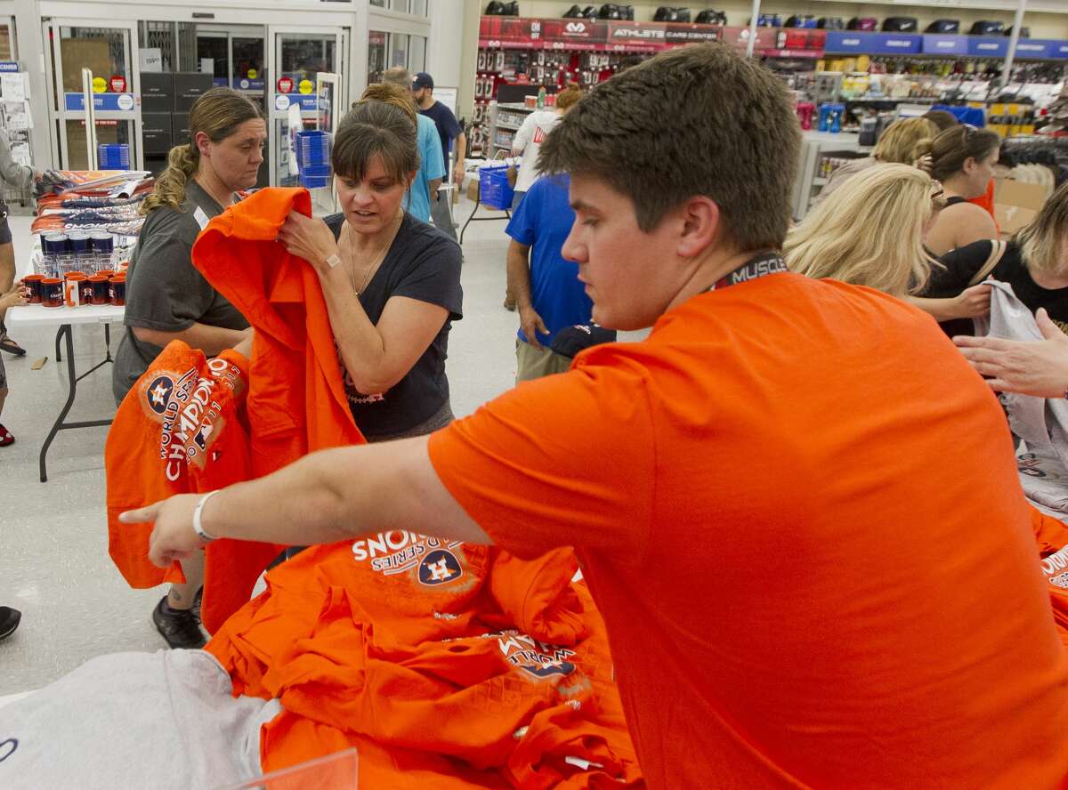 Houston Astros fans line up outside Academy to buy World Series