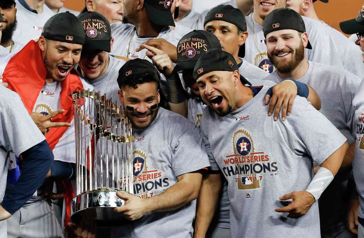 The Astros' World Series documentary includes a visit to the home of American League MVP Jose Altuve (holding trophy).