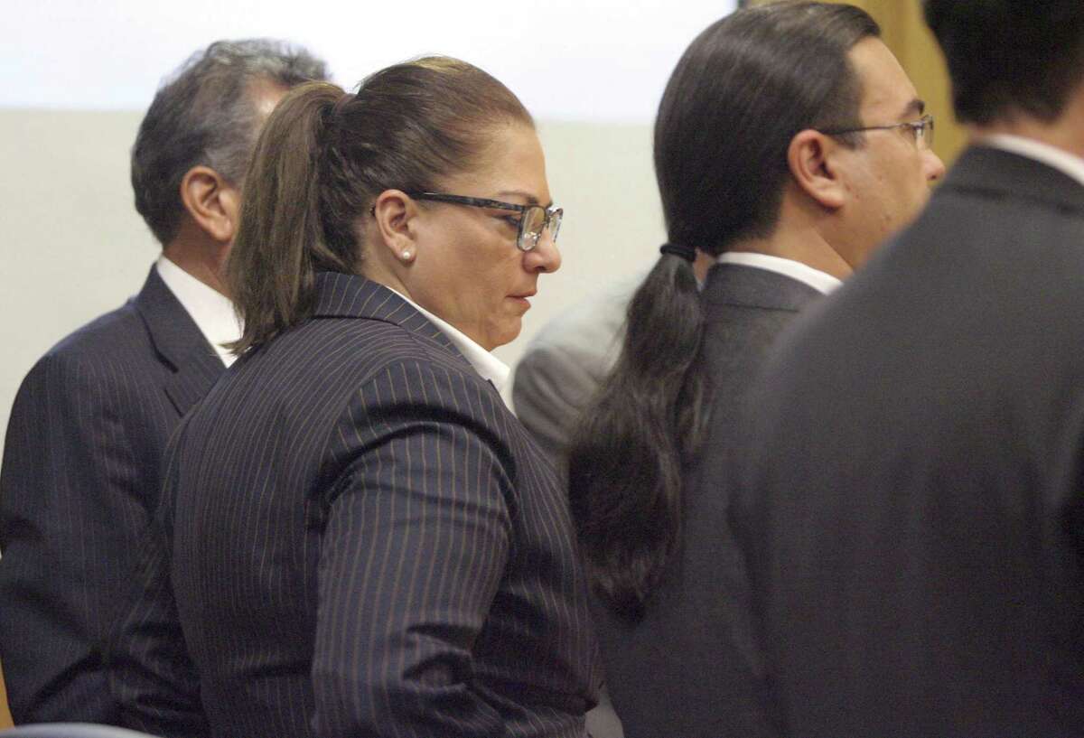 Monica Patterson listens as the guilty verdict is read in her capital murder trial at the Hidalgo County Court house 370th state District Court on Wednesday, Nov. 1, 2017, in Edinburg, Texas. Patterson, the former administrator of a South Texas hospice, was convicted of capital murder and other theft and misuse of funds charges in the January 2015 death of 96-year-old Martin Knell, whose estate she controlled. (Delcia Lopez//The Monitor via AP)