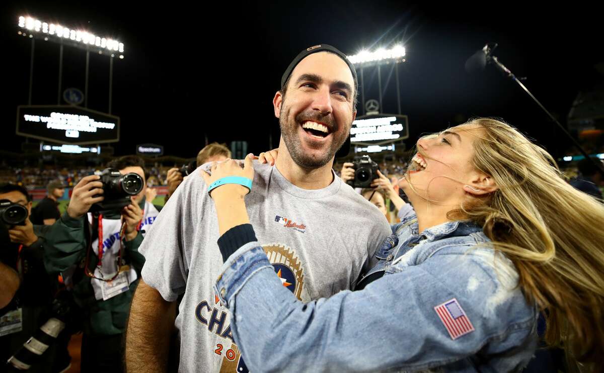 Justin Verlander #35 of the Houston Astros celebrates with fiancee Kate Upton after the Astros defeated the Los Angeles Dodgers 5-1 in game seven to win the 2017 World Series at Dodger Stadium on November 1, 2017 in Los Angeles, California.