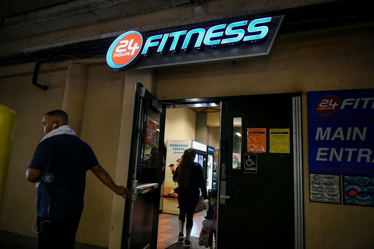 People enter and exit a 24 Hour Fitness location in San Francisco, CA, on Thursday November 2, 2017.