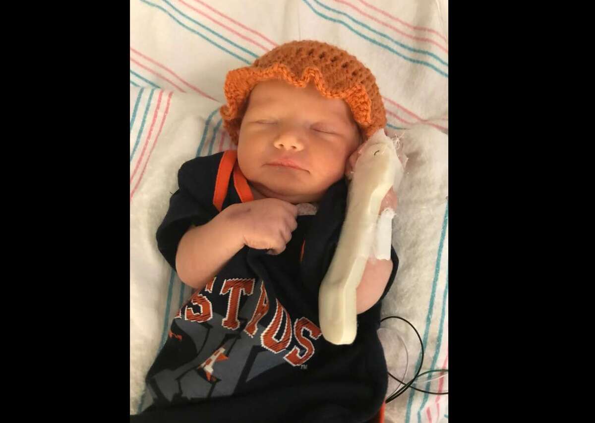 A Houston couple recently gave birth to "Zoe Georgia" an adorable baby girl named after Astros MVP George Springer. See how Astros fans are showing off their team pride.