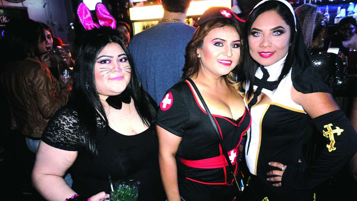 Jackie Lelloa, Sally Herrera and Selena Juarez at The Happy Hour Downtown Bar Friday, November 3, 2017