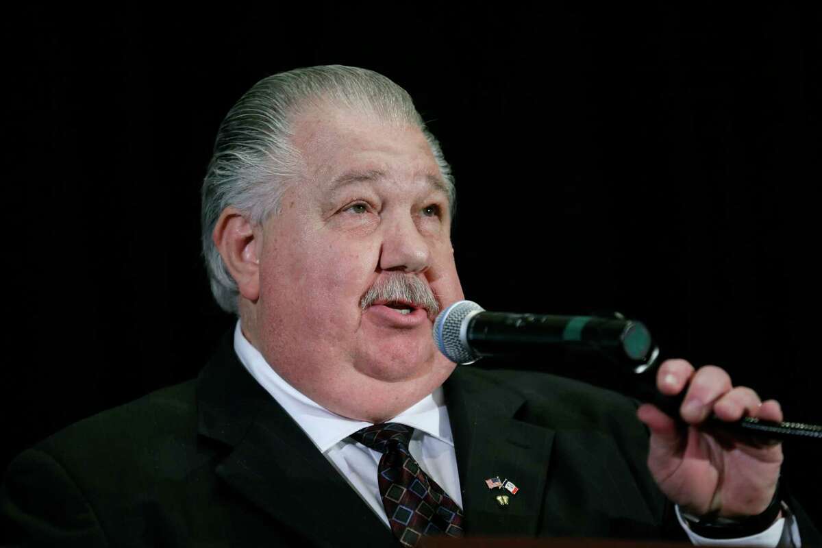 FILE-- In this April 11, 2014, file photo, Iowa Senate candidate Sam Clovis speaks during the Iowa Republican Party's annual Lincoln Day dinner in Cedar Rapids, Iowa. A GOP TV spot comparing castrating hogs to cutting spending, and Democrat Bruce Braley?’s comment that lawyers like him are better suited to serve on the Senate Judiciary Committee than ?“an Iowa farmer?” like U.S. Sen. Charles Grassley, have raised the Iowa?’s open Senate seat on the GOP?’s list of winnable races in the 2014 elections. (AP Photo/Charlie Neibergall) ORG XMIT: IACN302