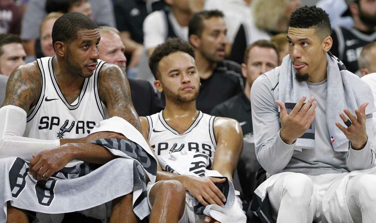 San Antonio SpursÕ LaMarcus Aldridge (from left) Kyle Anderson, and Danny Green sit on the bench late in second half action against the Golden State Warriors Thursday Nov. 2, 2017 at the AT&T Center. The Warriors won 112-92.