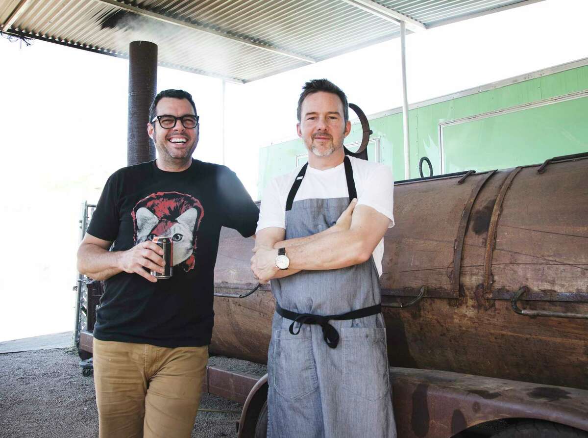 Franklin Barbecue pitmaster/owner Aaron Franklin, left, and Uchi's Tyson Cole are teaming up to open Loro restaurant in Austin, a merger of Japanese cuisine and barbecue.