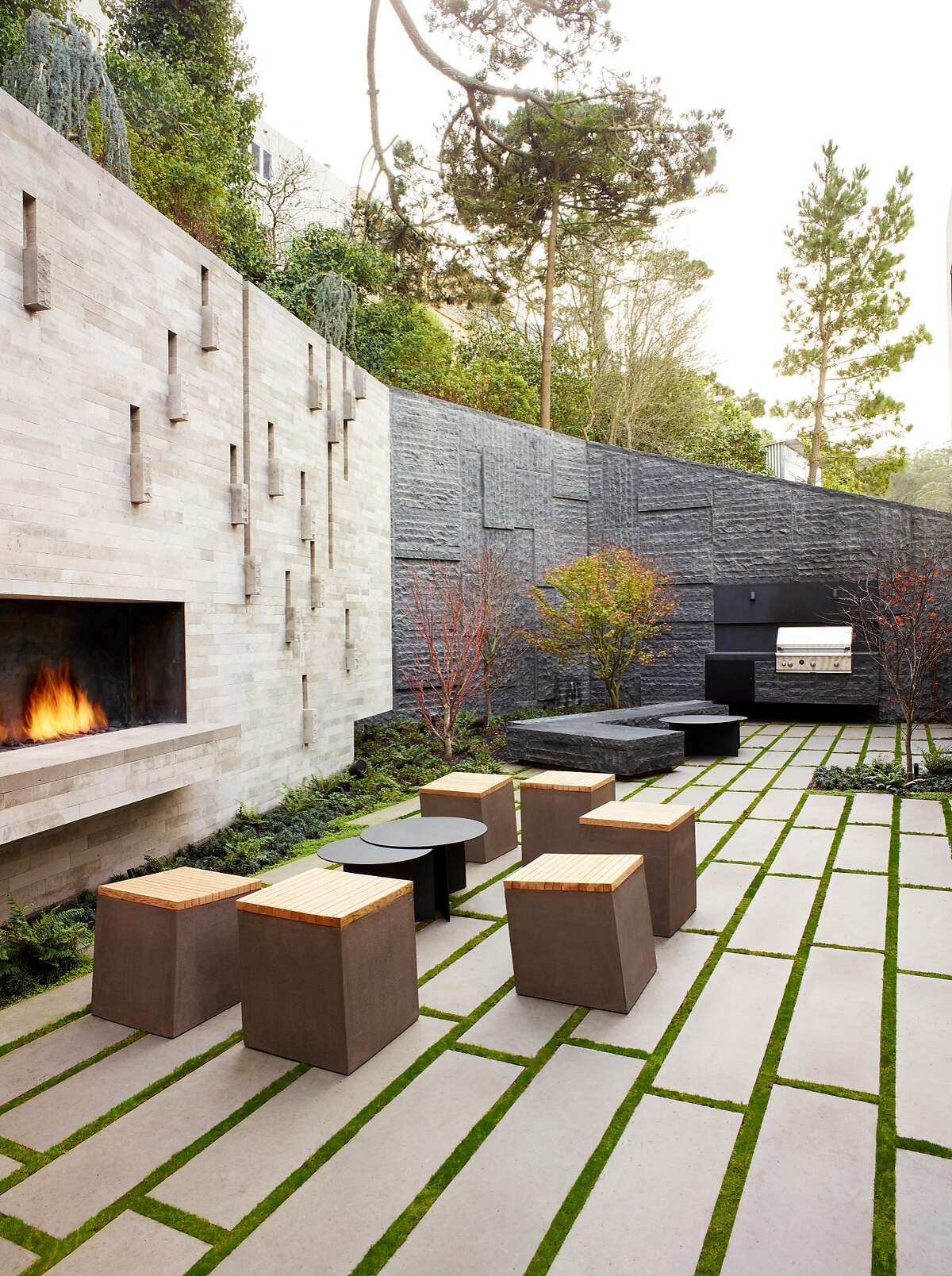 Inspired by the sculpture garden at the Hirschhorn Museum in Washington DC, landscape architects James Lord and Roderick Wyllie of Surface Design remade Abdur and Ana Chowbury's Cole Valley home into a climber's paradise with its scalable garden walls.