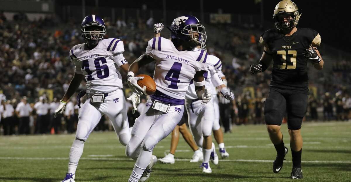 Angleton Wildcats My'kell Ross (4) scores a touchdown in the first half during the high school football game between Angleton Wildcats and the Foster Falcons in Rosenberg, TX on Friday, November 03, 2017.
