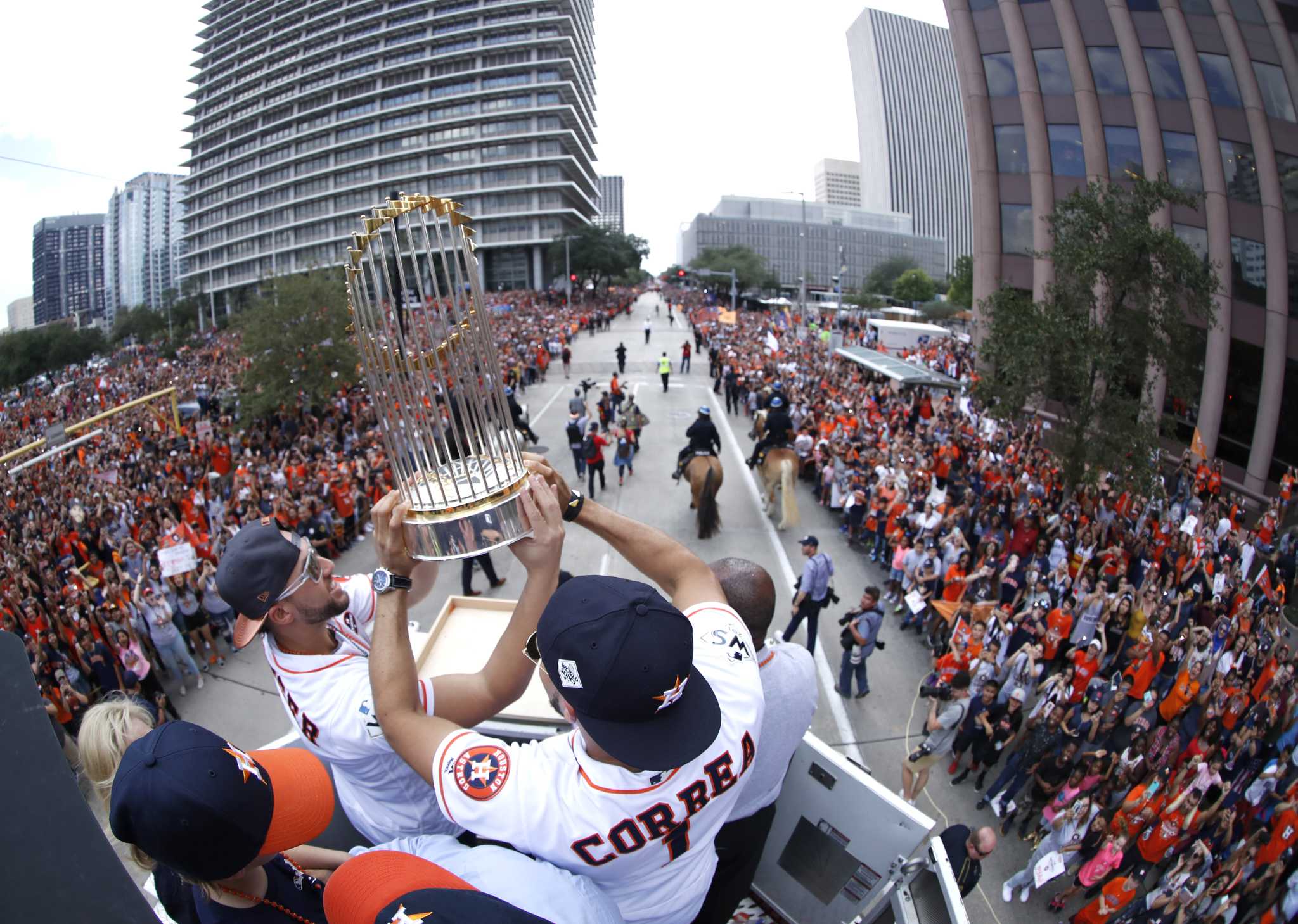 Astros, city cement their bond with a parade for the ages