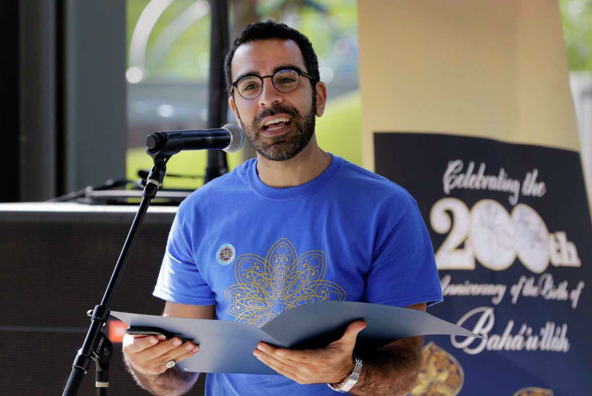 Abbas Mahvash reads a proclamation from mayor Sylvester Turner during the Baha'i celebration marking the bicentennial of the birth of the prophet Baha' u' llah Oct. 22, 2017 at Levy Park in Houston, TX. (Michael Wyke / For the Chronicle)