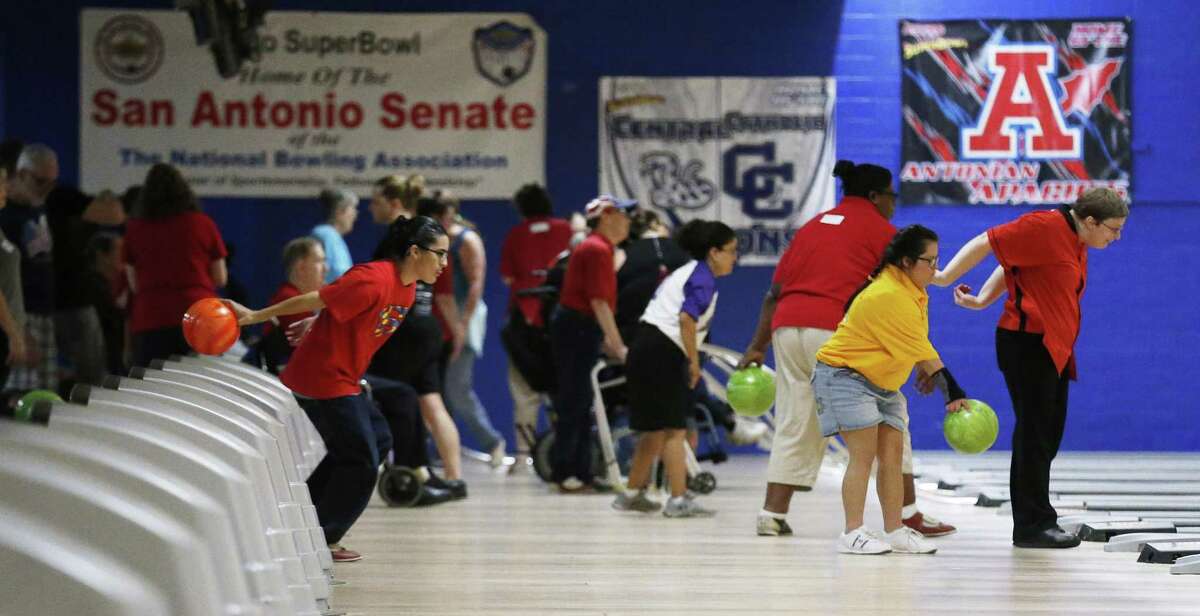 Special Olympians take part in a bowling tournament at Astro Superbowl on Saturday, Nov. 4, 2017. Winners from the tournament qualify for the Special Olympics USA Games in 2018. (Kin Man Hui/San Antonio Express-News)