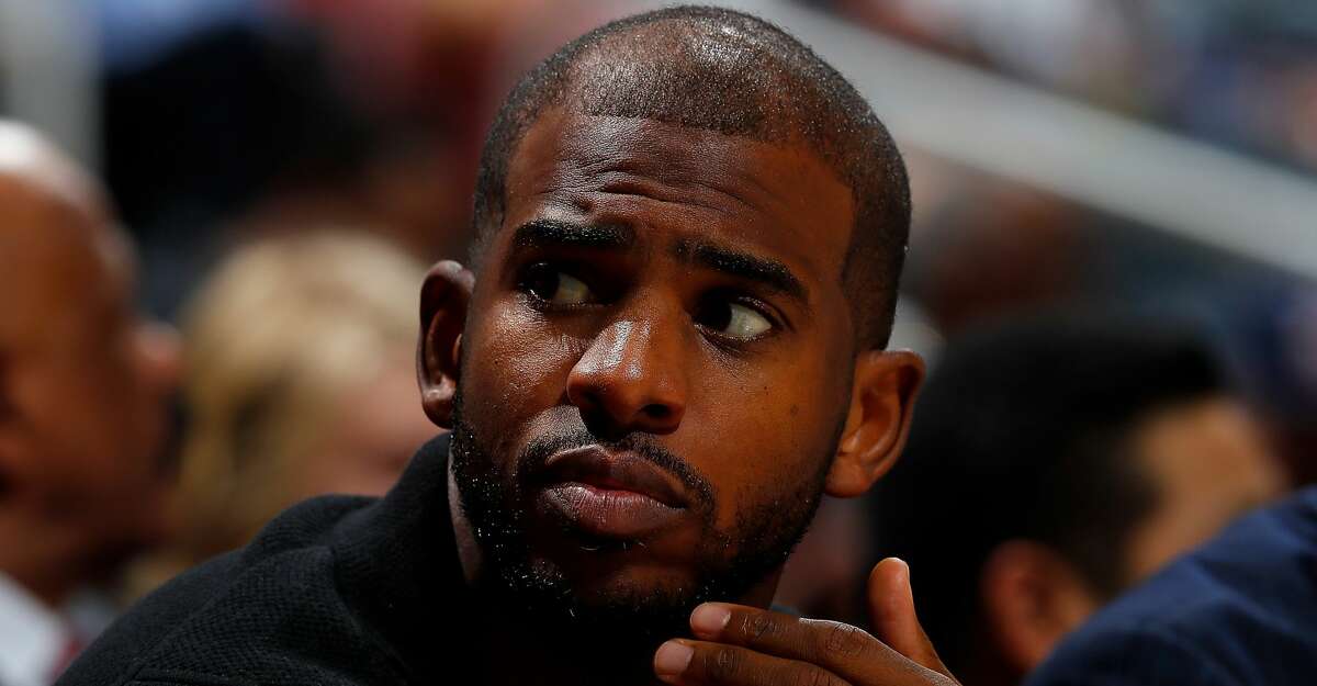 ATLANTA, GA - NOVEMBER 03: Chris Paul #3 of the Houston Rockets looks on from the bench against the Atlanta Hawks at Philips Arena on November 3, 2017 in Atlanta, Georgia. NOTE TO USER: User expressly acknowledges and agrees that, by downloading and or using this photograph, User is consenting to the terms and conditions of the Getty Images License Agreement. (Photo by Kevin C. Cox/Getty Images)