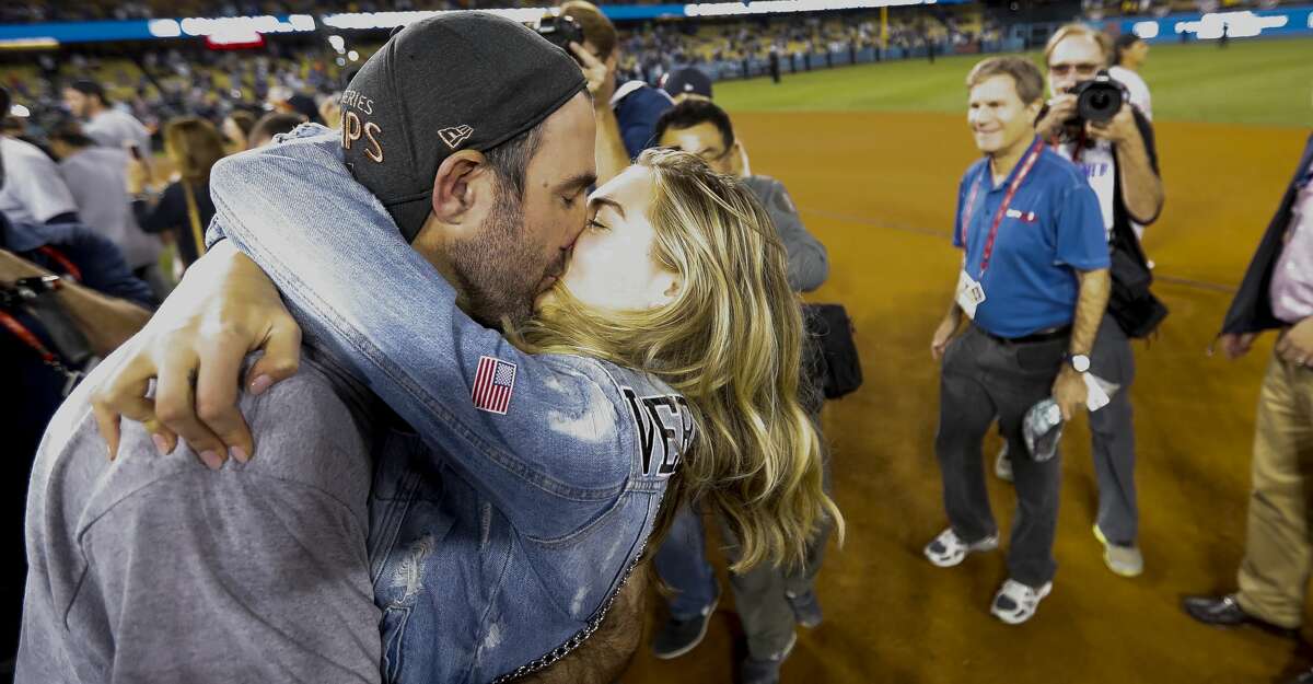 Houston Astros starting pitcher Justin Verlander (35) kisses Kate Upton after winning Game 7 of the World Series at Dodger Stadium on Wednesday, Nov. 1, 2017, in Los Angeles. ( Karen Warren / Houston Chronicle )