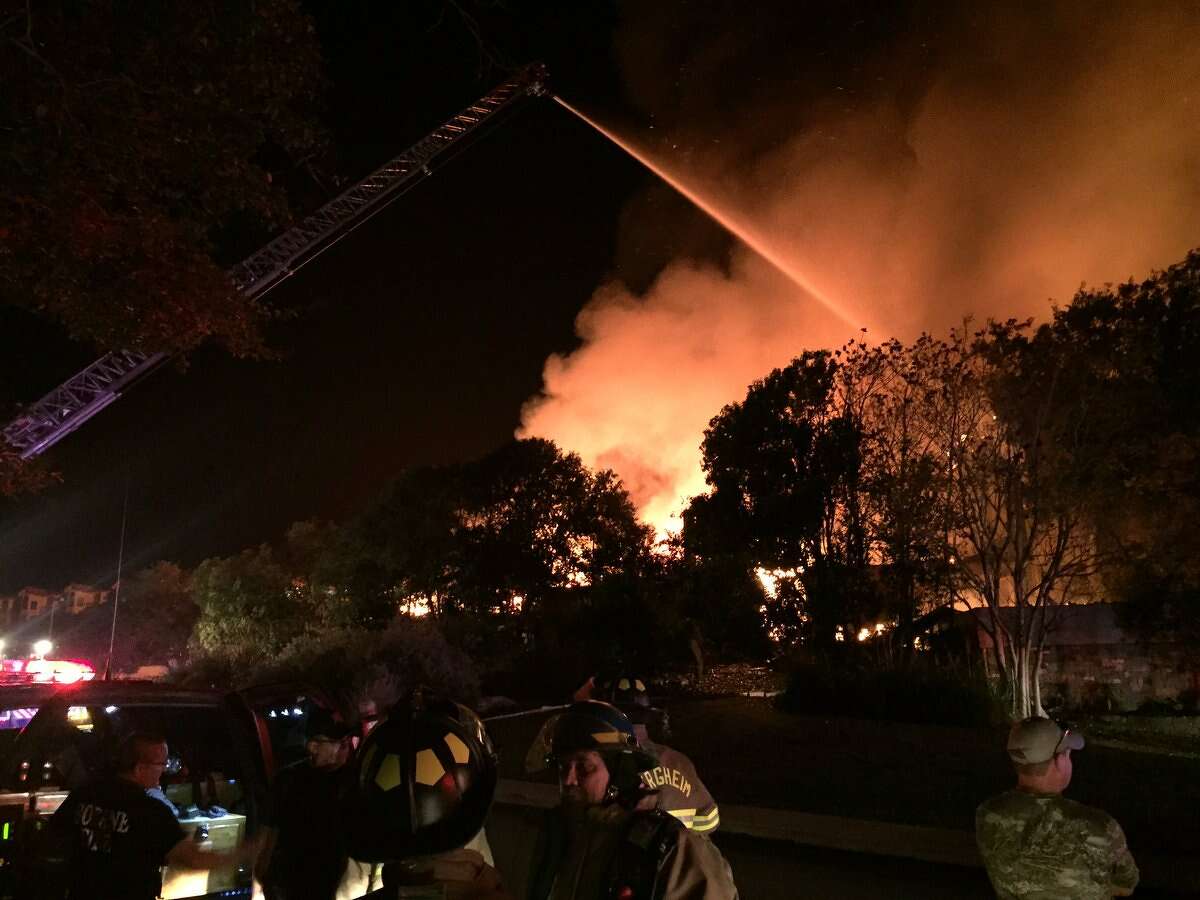 Firefighter battle a fire that destroyed the club house at Tapatio Springs Resort Saturday, Nov. 4, 2017.