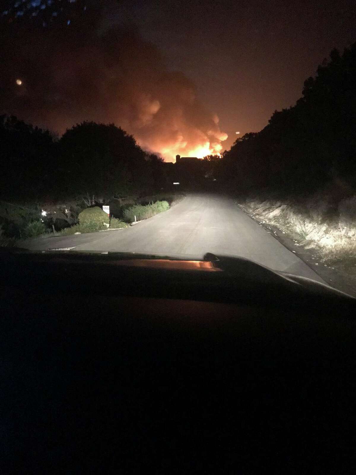 Firefighter battle a fire that destroyed the club house at Tapatio Springs Resort Saturday, Nov. 4, 2017.