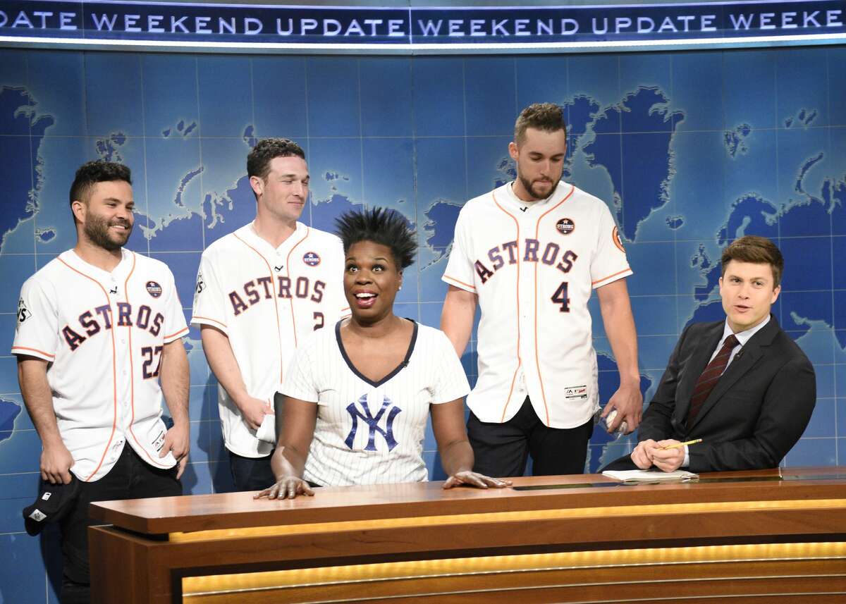 SATURDAY NIGHT LIVE -- Episode 1729 -- Pictured: (l-r) JosÃ© Altuve, Alex Bregman, George Springer of The Houston Astros Leslie Jones, Colin Jost during "Weekend Update" in Studio 8H on Saturday, November 4, 2017 -- (Photo by: Will Heath/NBC/NBCU Photo Bank via Getty Images)